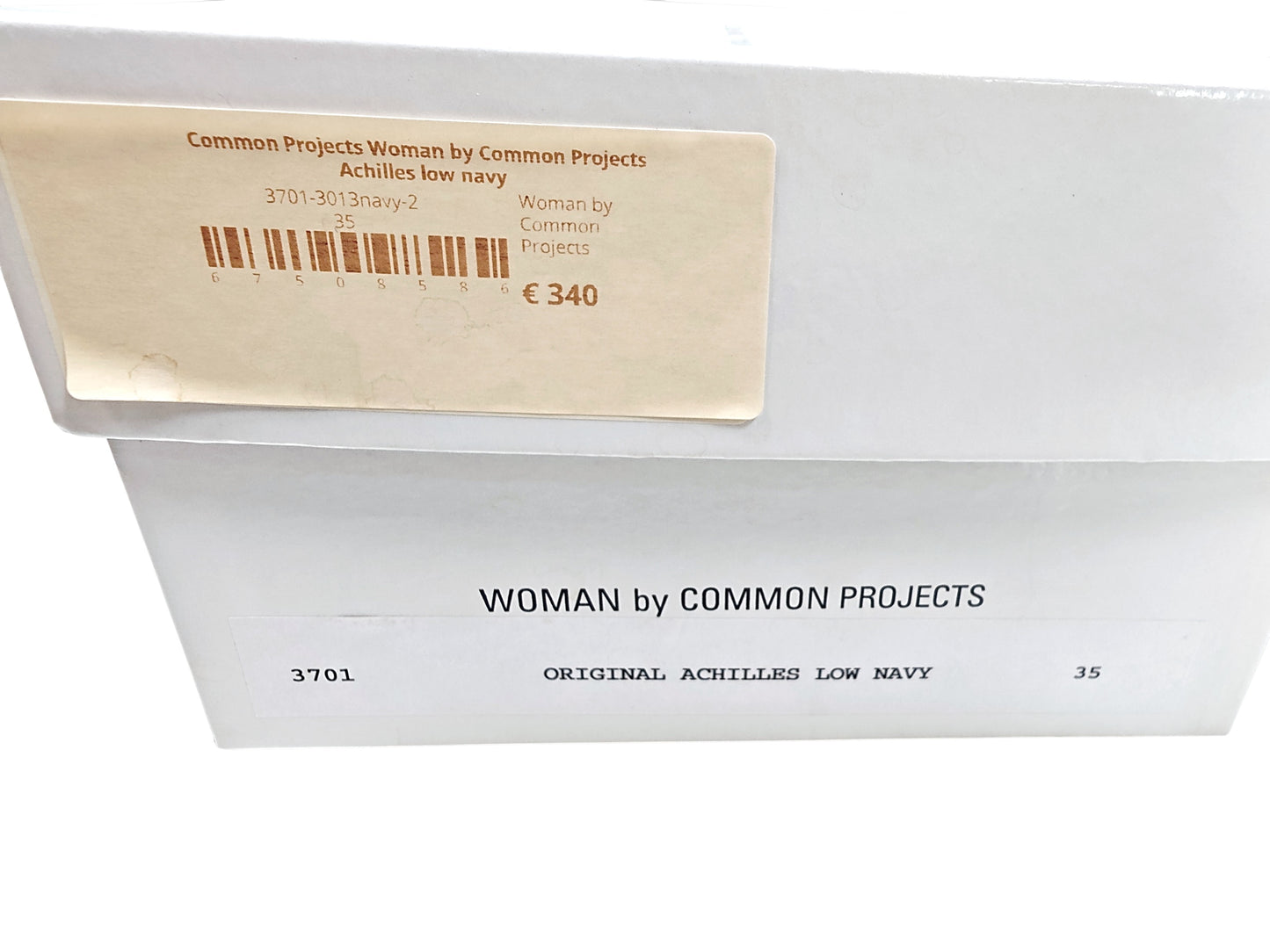 Woman by Common Projects Original Achilles Low Navy Sneakers